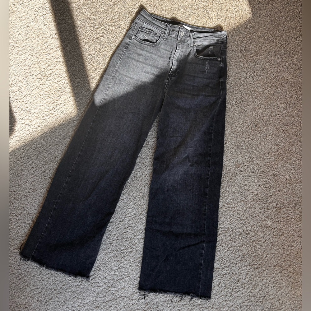 Frayed black stretchy denim